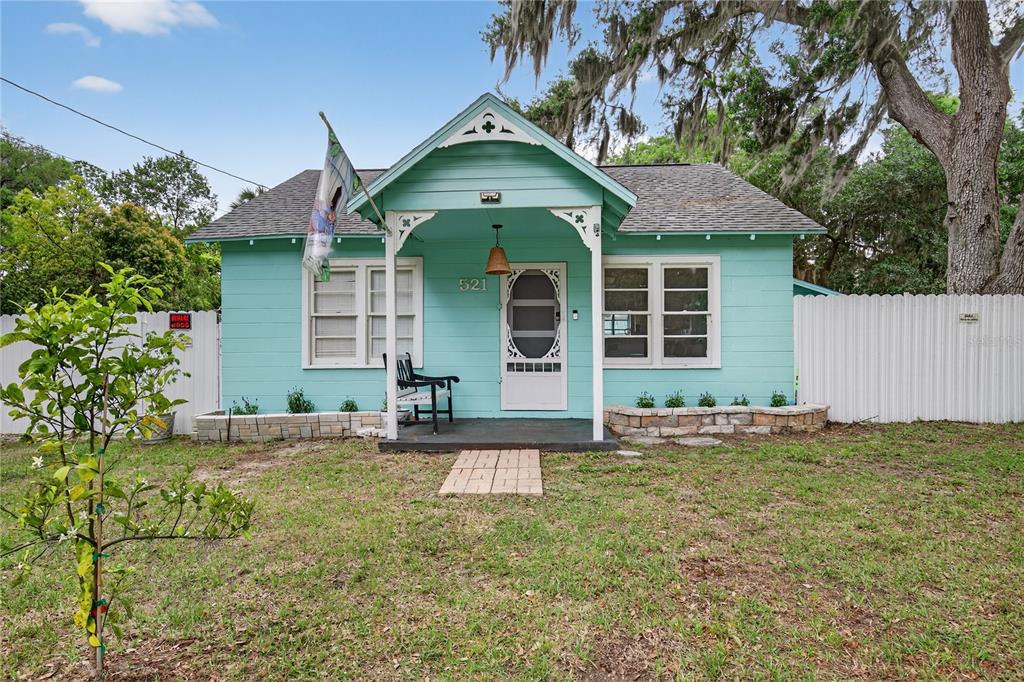 521 Michigan Street Mount Dora, FL 32757 - Photo 1 of 27 front view of a house with a yard