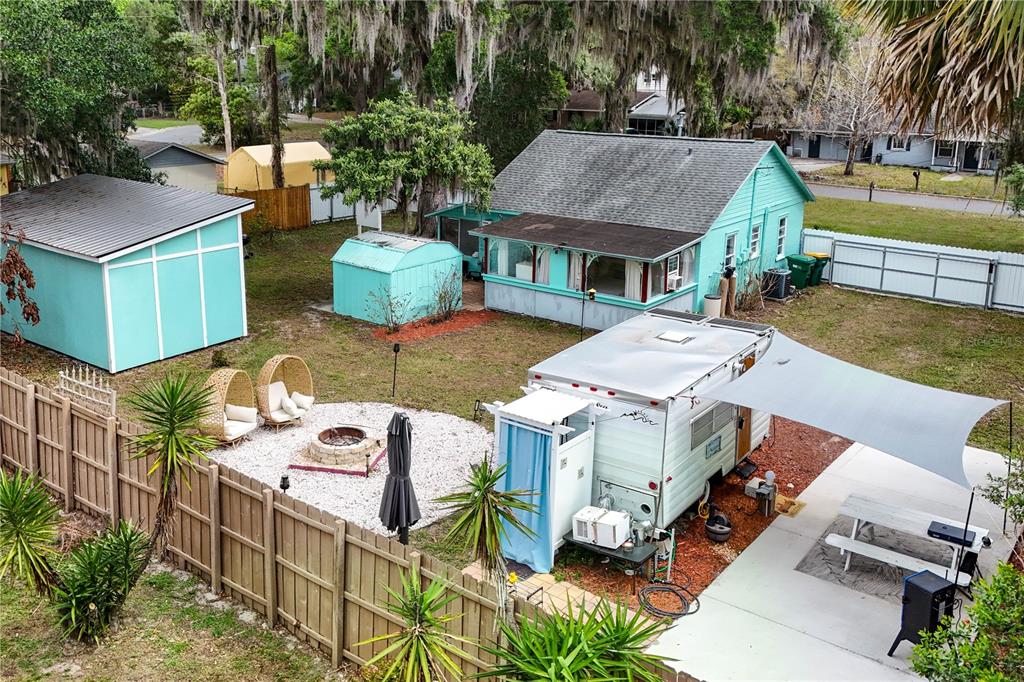 521 Michigan Street Mount Dora, FL 32757 - Photo 16 of 27 an aerial view of a house with outdoor seating