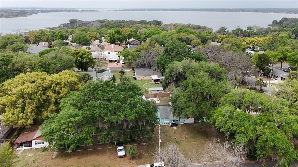 521 Michigan Street Mount Dora, FL 32757 - Photo 27 of 27 an aerial view of a house with yard