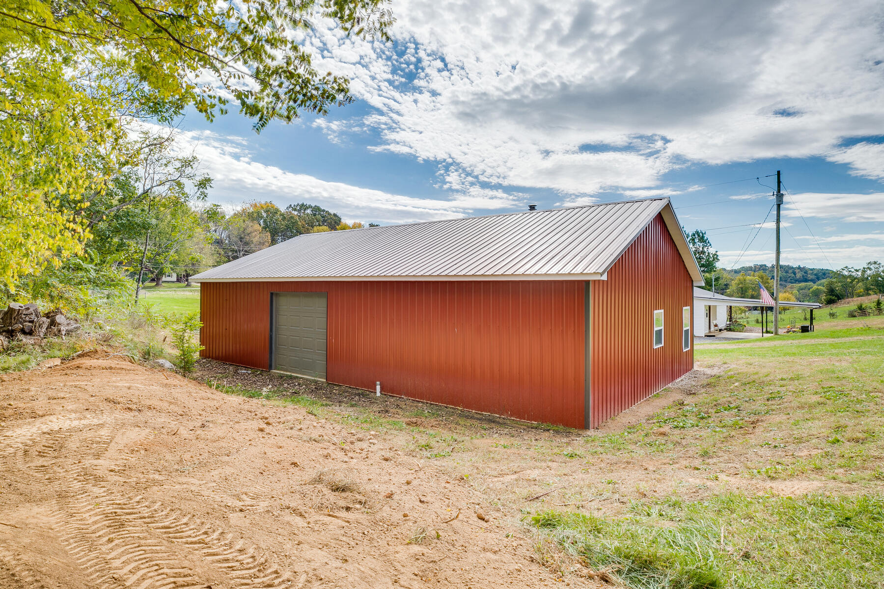165 Jockey Road Chuckey, TN 37641 - Photo 41 of 69 Back of Outbuilding w garage door