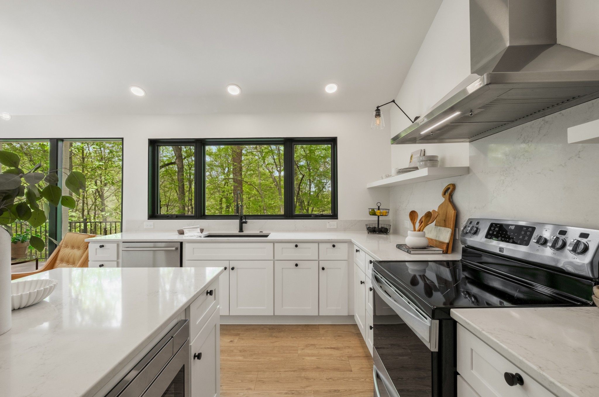 880 High Point Ridge Road Franklin, TN 37069 - Photo 12 of 51 a large kitchen with stainless steel appliances granite countertop a stove and a sink