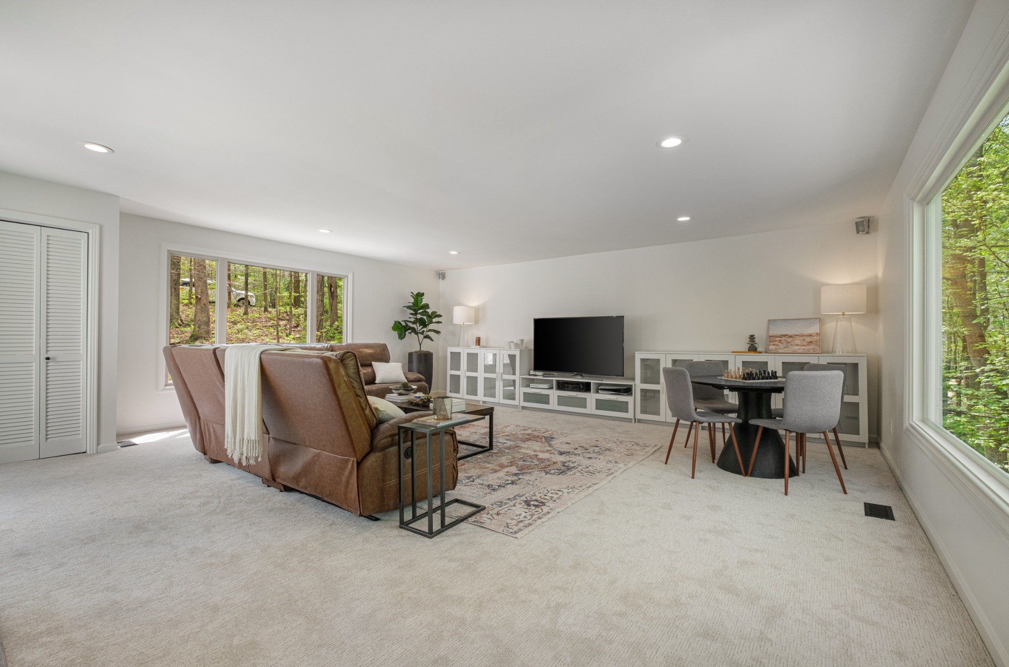 880 High Point Ridge Road Franklin, TN 37069 - Photo 16 of 51 a living room with furniture and a flat screen tv