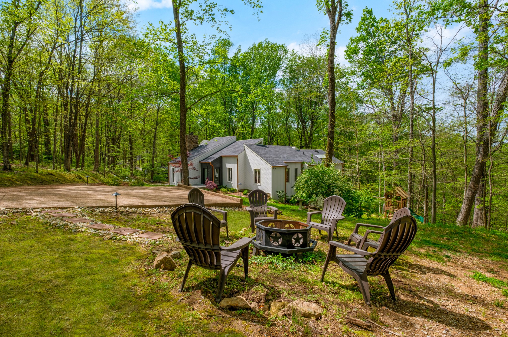 880 High Point Ridge Road Franklin, TN 37069 - Photo 47 of 51 a view of a house with backyard patio and outdoor seating