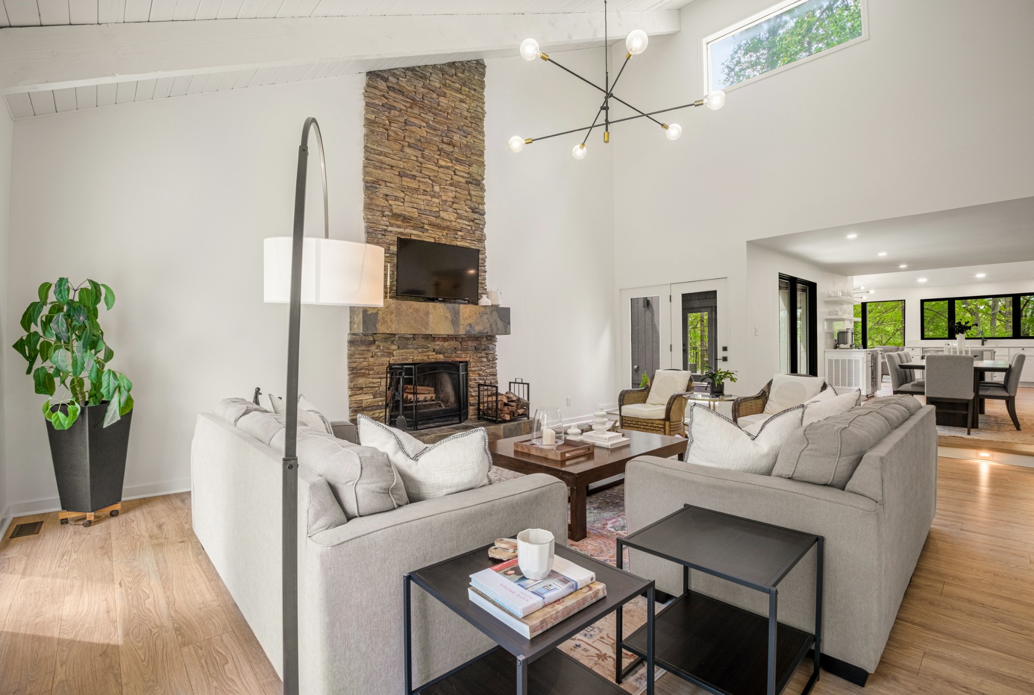 880 High Point Ridge Road Franklin, TN 37069 - Photo 5 of 51 a living room with furniture a fireplace and a potted plant