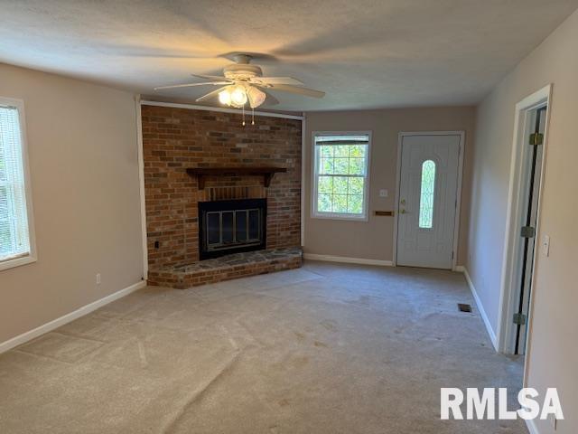538 South 17th Street Murphysboro, IL 62966 - Photo 4 of 26 an empty room with windows and fireplace