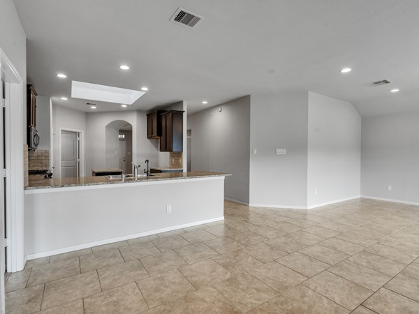 2939 Canadian Goose Lane Baytown, TX 77521 - Photo 11 of 48 a view of kitchen with refrigerator and window