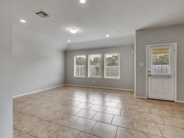 2939 Canadian Goose Lane Baytown, TX 77521 - Photo 16 of 48 The spacious living area opens to the back yard with a full privacy fence.