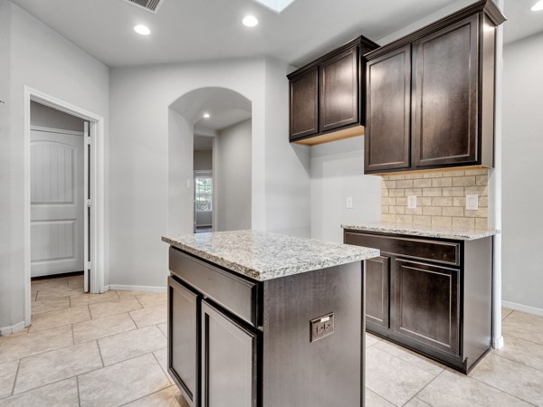 2939 Canadian Goose Lane Baytown, TX 77521 - Photo 21 of 48 There are three entrances to the kitchen including thru the laundry room and garage.