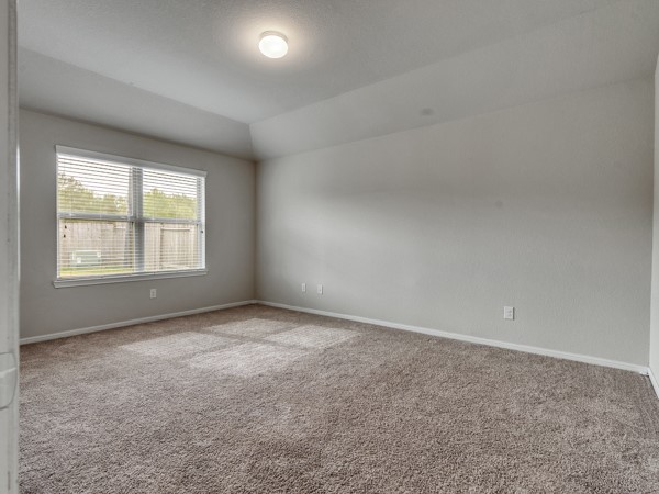 2939 Canadian Goose Lane Baytown, TX 77521 - Photo 22 of 48 an empty room with windows