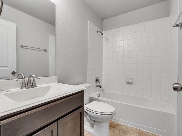 2939 Canadian Goose Lane Baytown, TX 77521 - Photo 32 of 48 a bathroom with a sink a toilet and shower