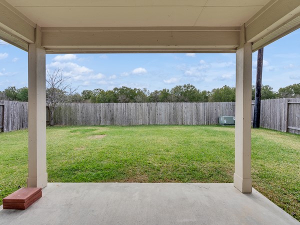 2939 Canadian Goose Lane Baytown, TX 77521 - Photo 34 of 48 a view of a backyard with a tub and plants