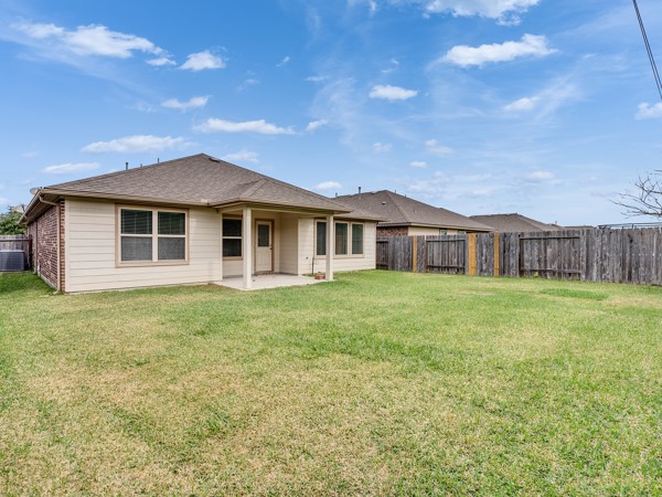 2939 Canadian Goose Lane Baytown, TX 77521 - Photo 37 of 48 a front view of a house with garden
