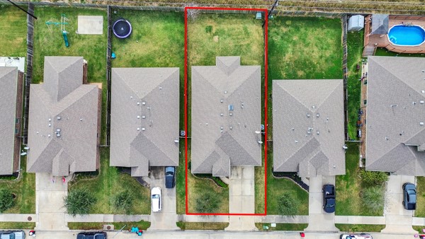 2939 Canadian Goose Lane Baytown, TX 77521 - Photo 39 of 48 an aerial view of house with yard and swimming pool