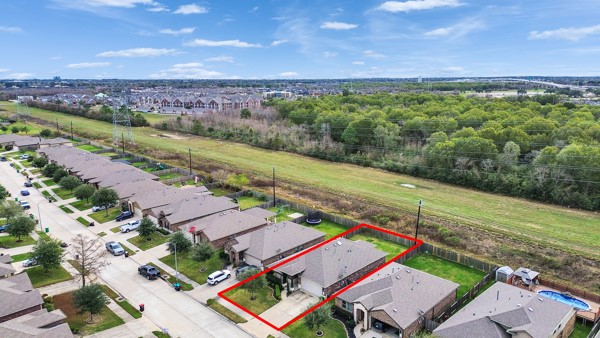 2939 Canadian Goose Lane Baytown, TX 77521 - Photo 40 of 48 an aerial view of a houses with a yard