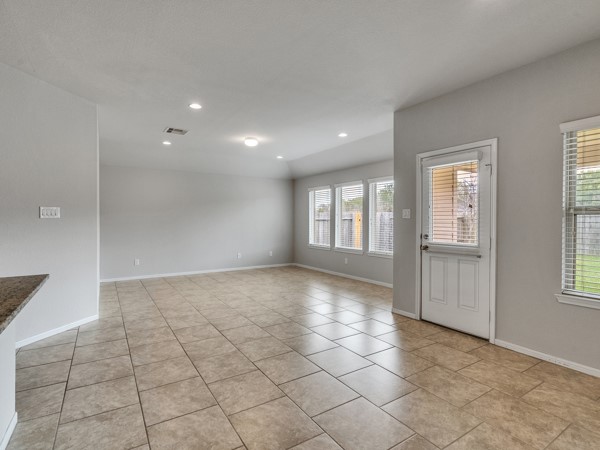 2939 Canadian Goose Lane Baytown, TX 77521 - Photo 10 of 48 a view of an empty room with a window