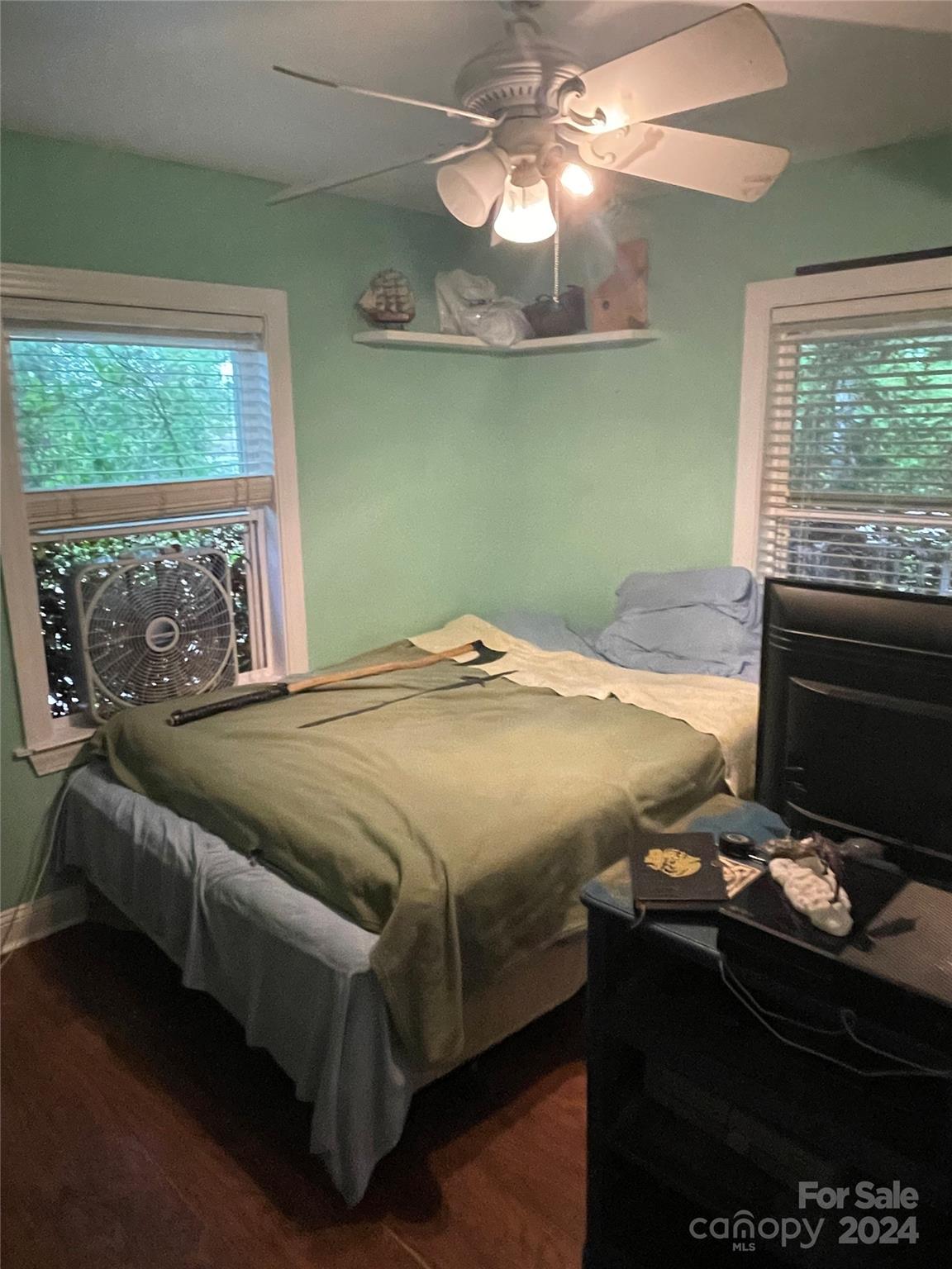 64 Deaton Street Ruby, SC 29741 - Photo 11 of 23 a bedroom with a bed and a chandelier