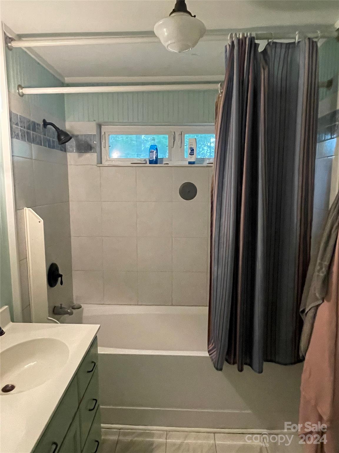 64 Deaton Street Ruby, SC 29741 - Photo 14 of 23 a bathroom with a sink and a mirror