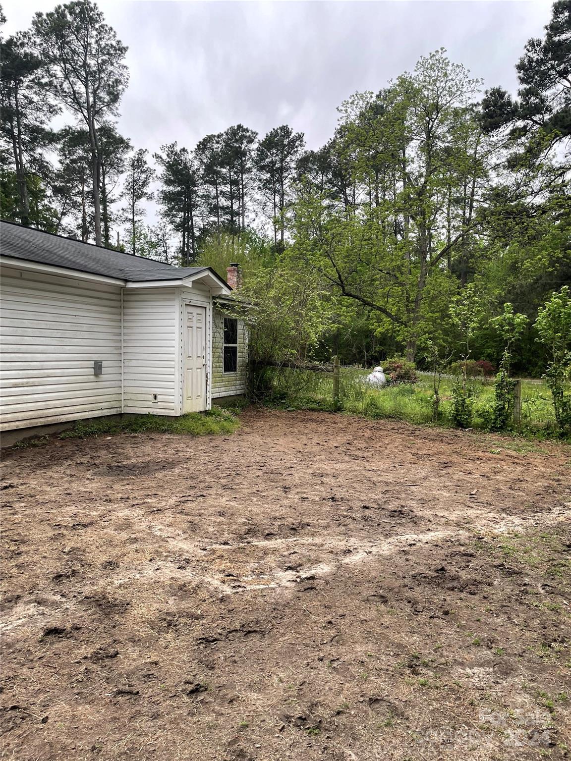 64 Deaton Street Ruby, SC 29741 - Photo 17 of 23 a view of a backyard with large trees