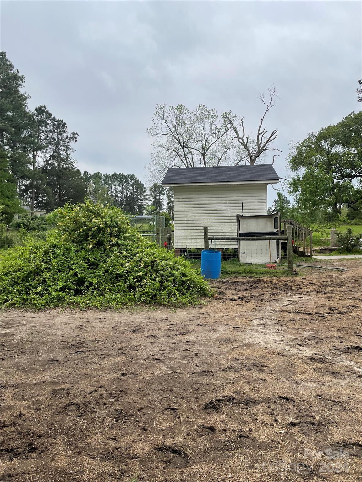 64 Deaton Street Ruby, SC 29741 - Photo 21 of 23 front view of a house with a yard