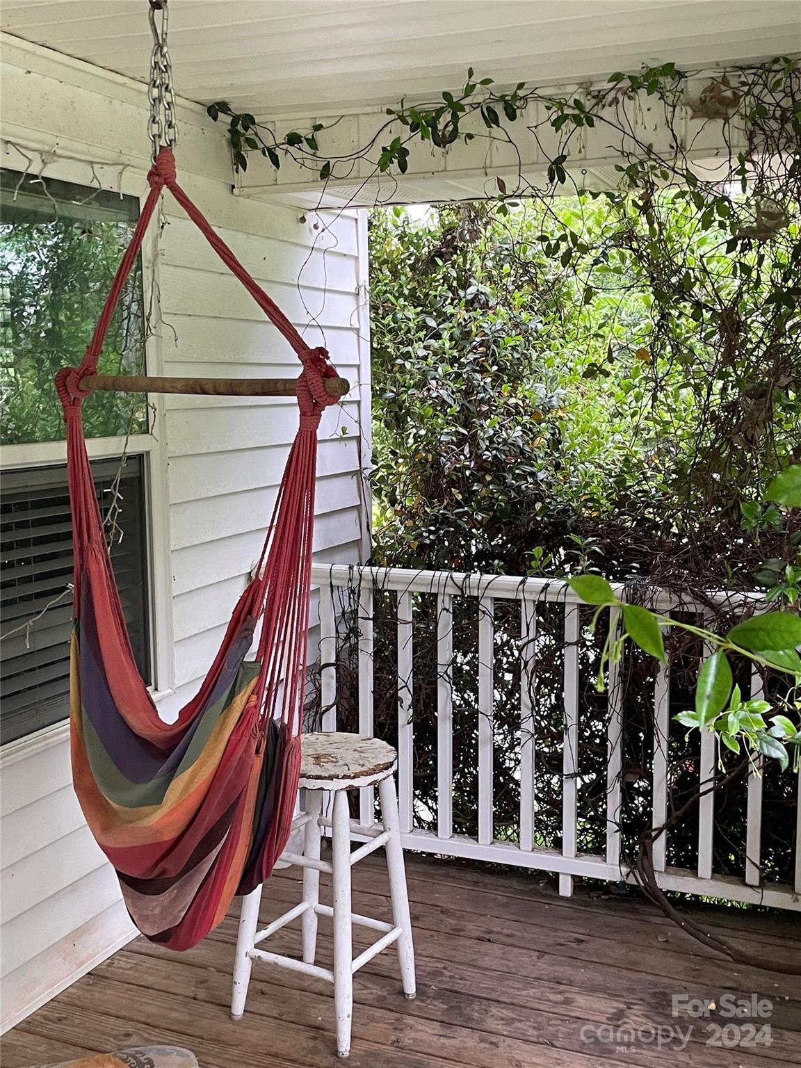 64 Deaton Street Ruby, SC 29741 - Photo 3 of 23 a balcony with chairs and wooden fence