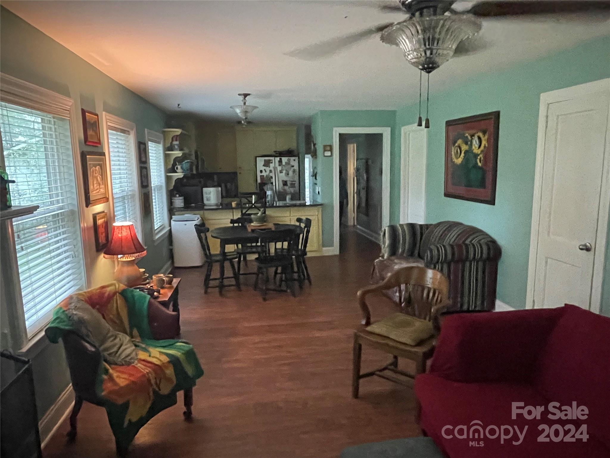 64 Deaton Street Ruby, SC 29741 - Photo 5 of 23 a living room with furniture and a chandelier