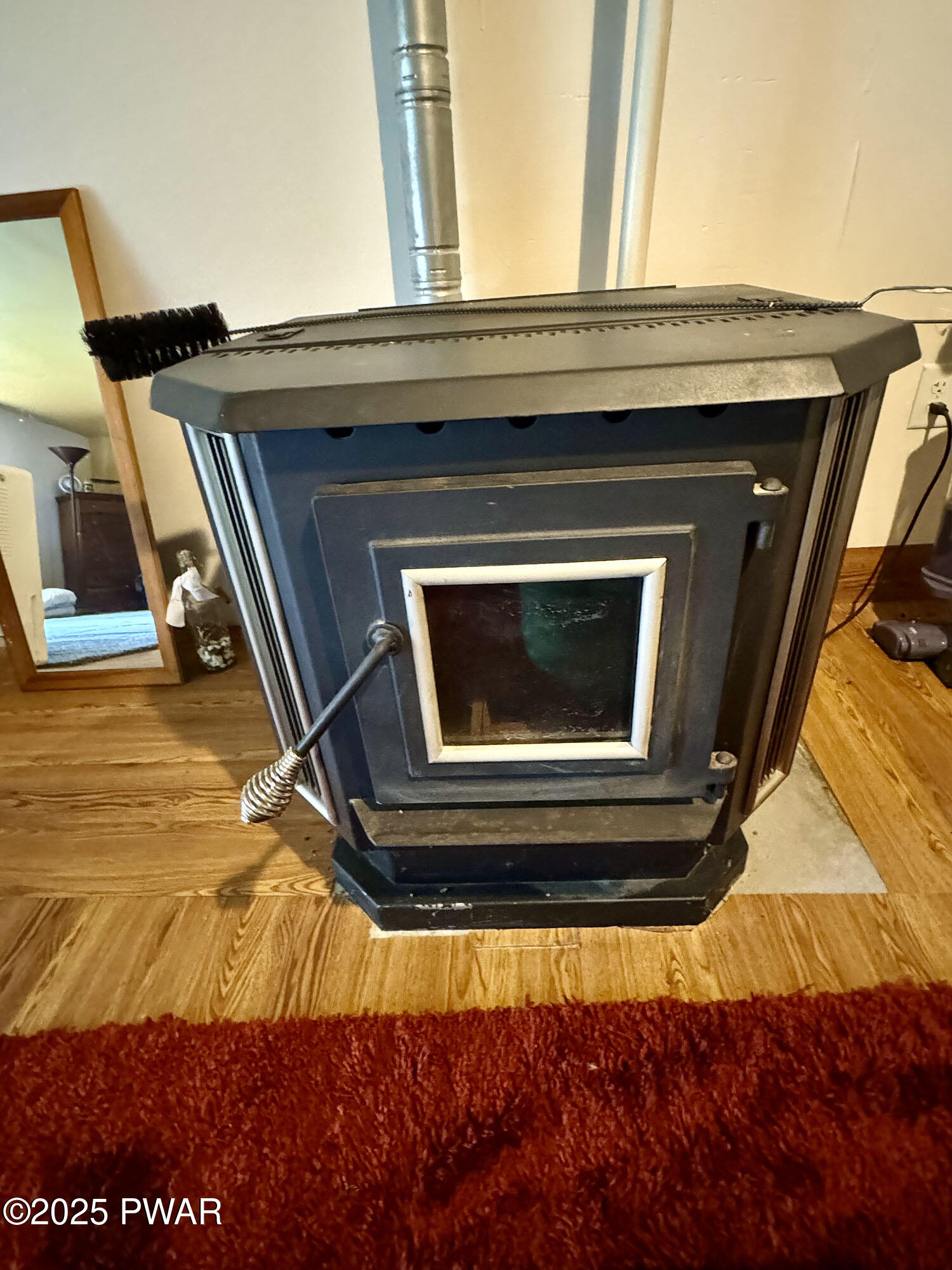 64 Mud Pond Road, Unit 3 LOTS ) Equinunk, PA 18417 - Photo 30 of 41 Downstairs pellet stove