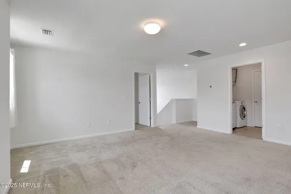 a bathroom with a sink a vanity and a mirror