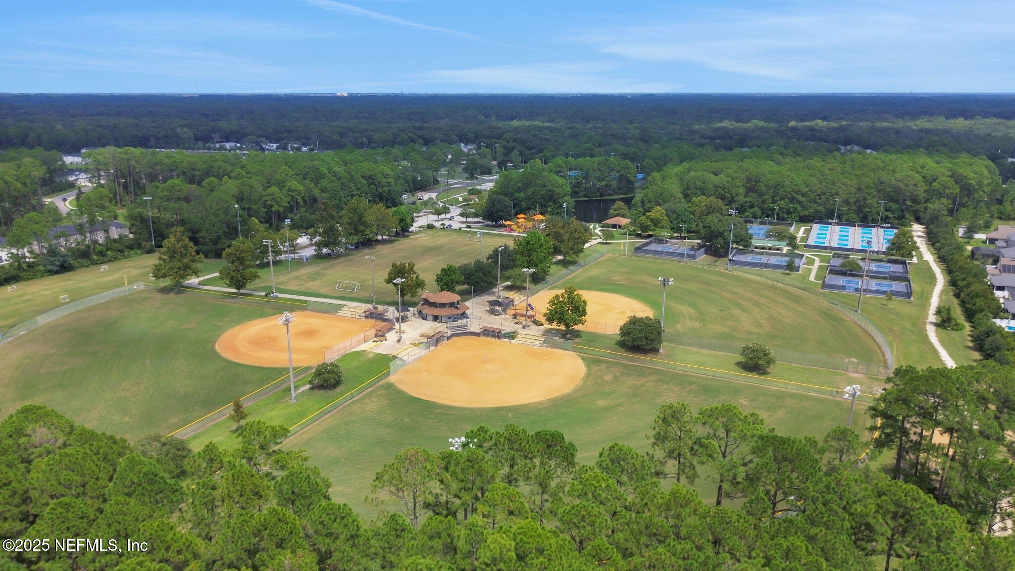 277 Sandstone Drive St. Augustine, FL 32086 - Photo 46 of 47 a view of a swimming pool with a yard