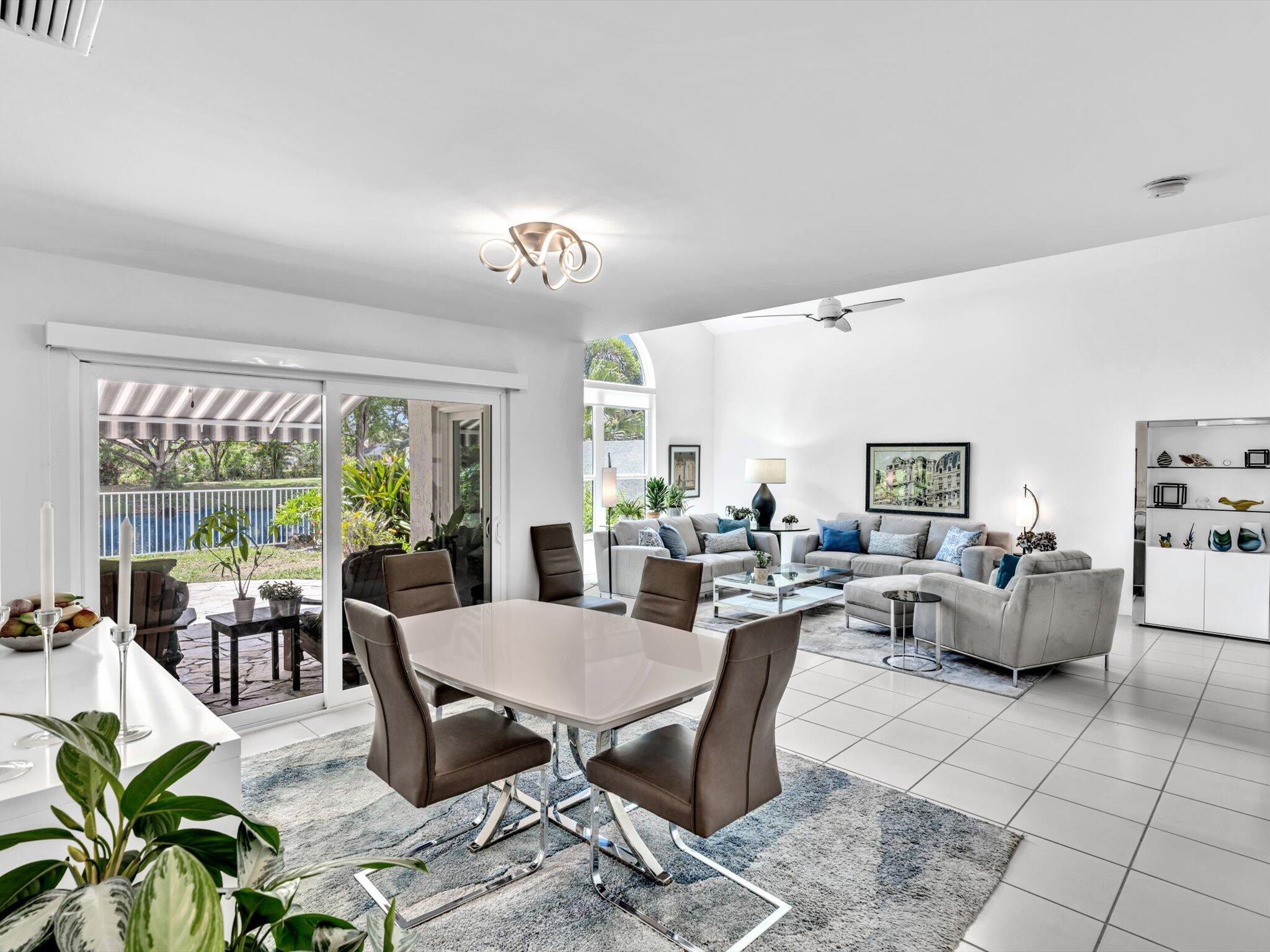 6307 Via Palladium Boca Raton, FL 33433 - Photo 30 of 85 a view of a dining room with furniture window and outside view