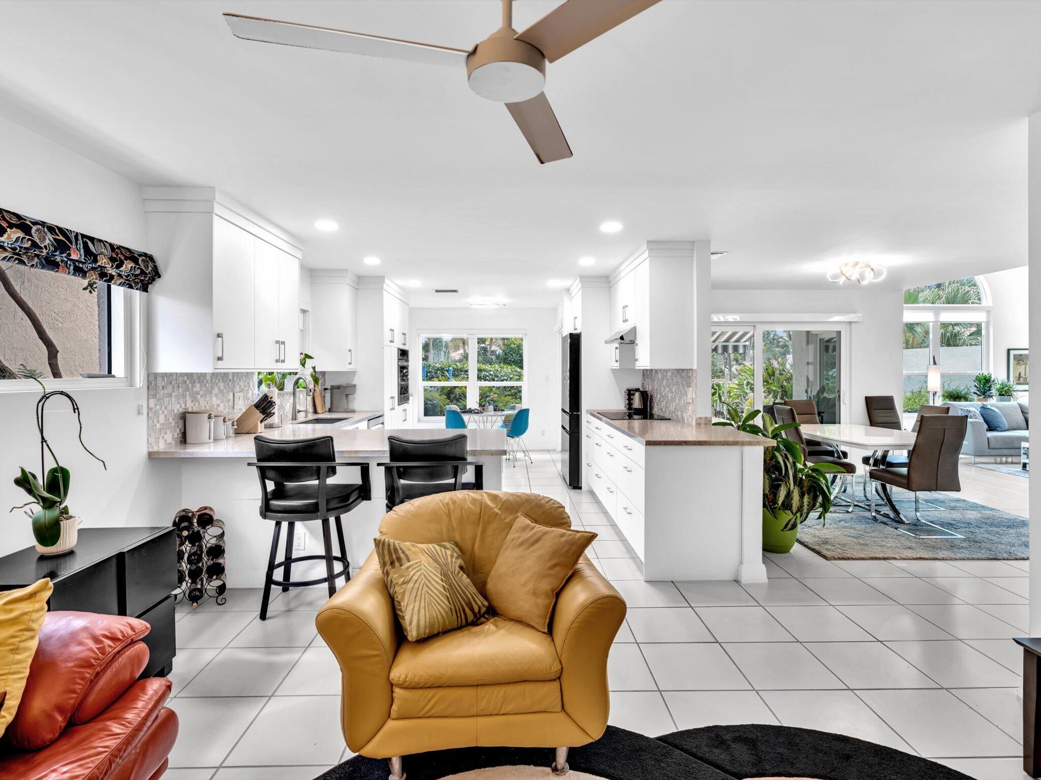 6307 Via Palladium Boca Raton, FL 33433 - Photo 32 of 85 a living room with furniture and kitchen view