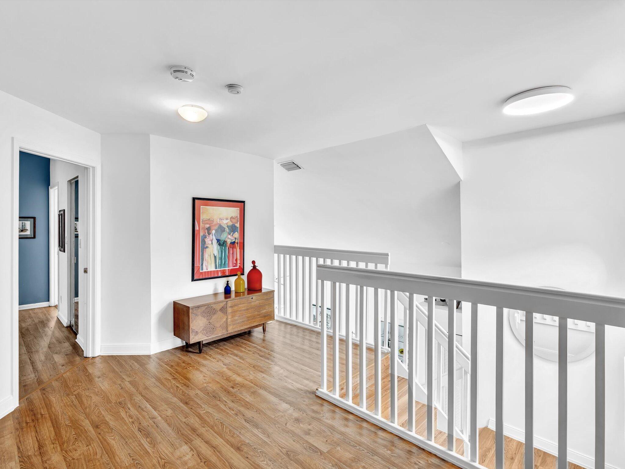 6307 Via Palladium Boca Raton, FL 33433 - Photo 60 of 85 a view of a livingroom with wooden floor and a ceiling fan