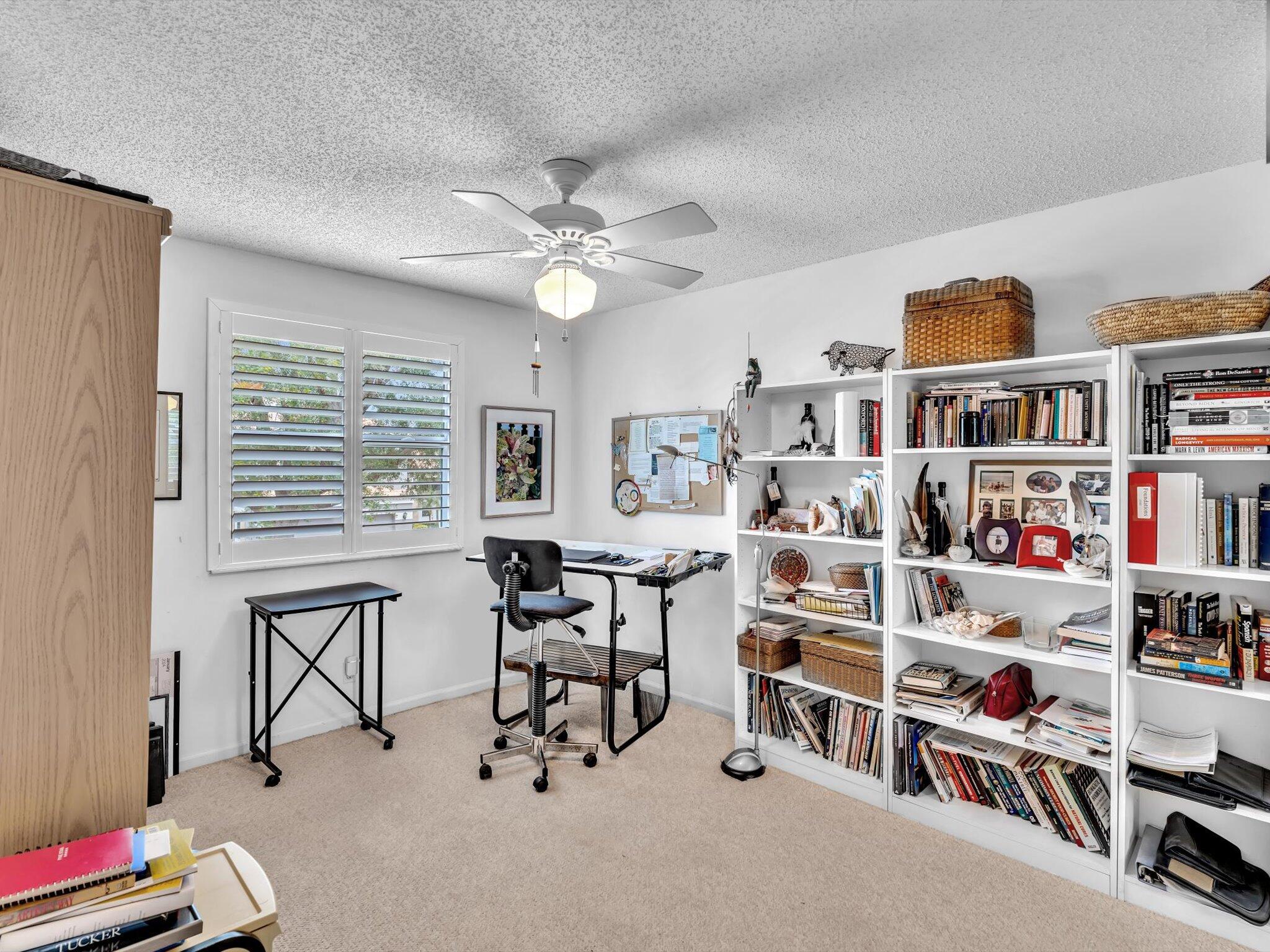 6307 Via Palladium Boca Raton, FL 33433 - Photo 61 of 85 a view of a workspace with furniture and toys
