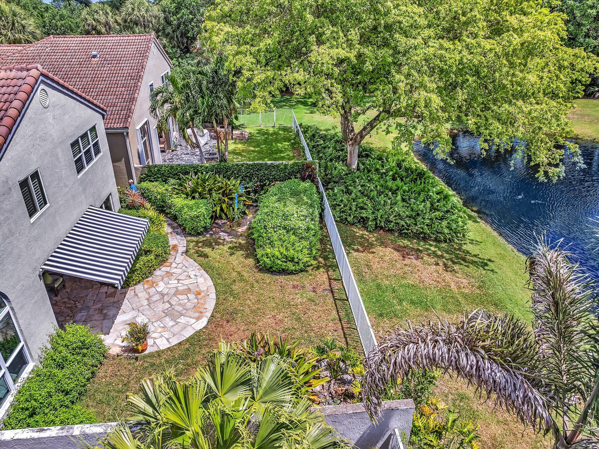 6307 Via Palladium Boca Raton, FL 33433 - Photo 77 of 85 a view of a backyard with potted plants