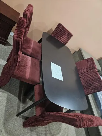 a view of balcony with furniture