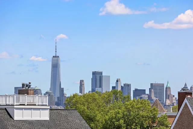 a view of a city with tall buildings