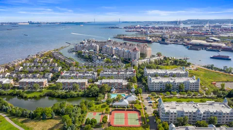 a view of a city and lake