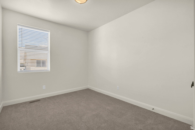 4016 South Burch Way Ogden, UT 84405 - Photo 21 of 30 Carpeted room with a window featuring horizontal blinds