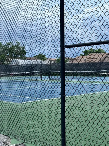 front view of a house with a small yard
