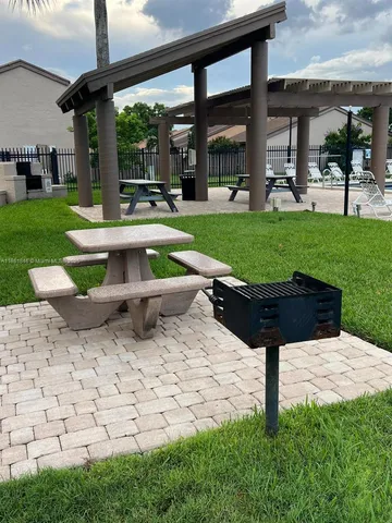 a view of a lake with a yard