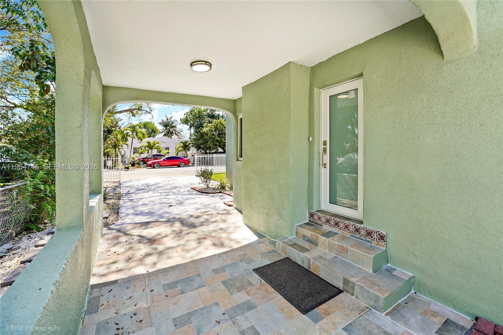 1139 Northwest 37th Street Miami, FL 33127 - Photo 5 of 27 Carport area, Entry