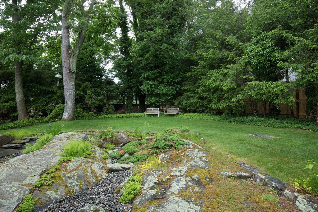 28 Barberry Road Lexington, MA 02421 - Photo 2 of 11 a view of a green field with trees