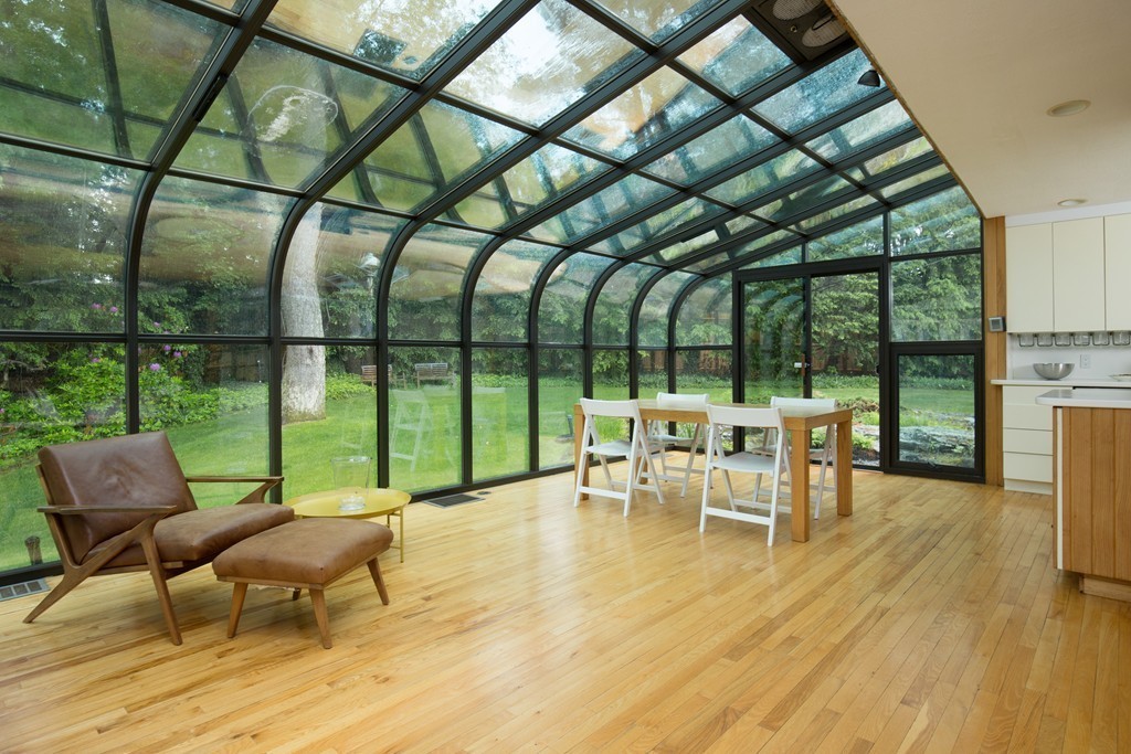 28 Barberry Road Lexington, MA 02421 - Photo 5 of 11 a view of a patio with dining table and chairs