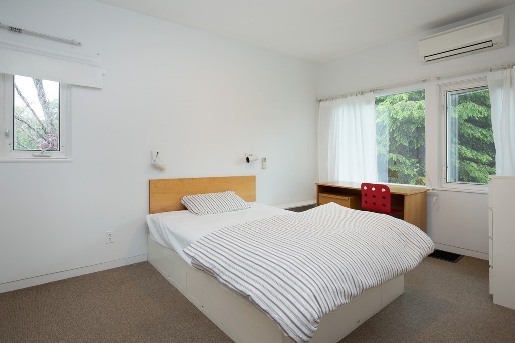 28 Barberry Road Lexington, MA 02421 - Photo 7 of 11 a bedroom with a bed and window