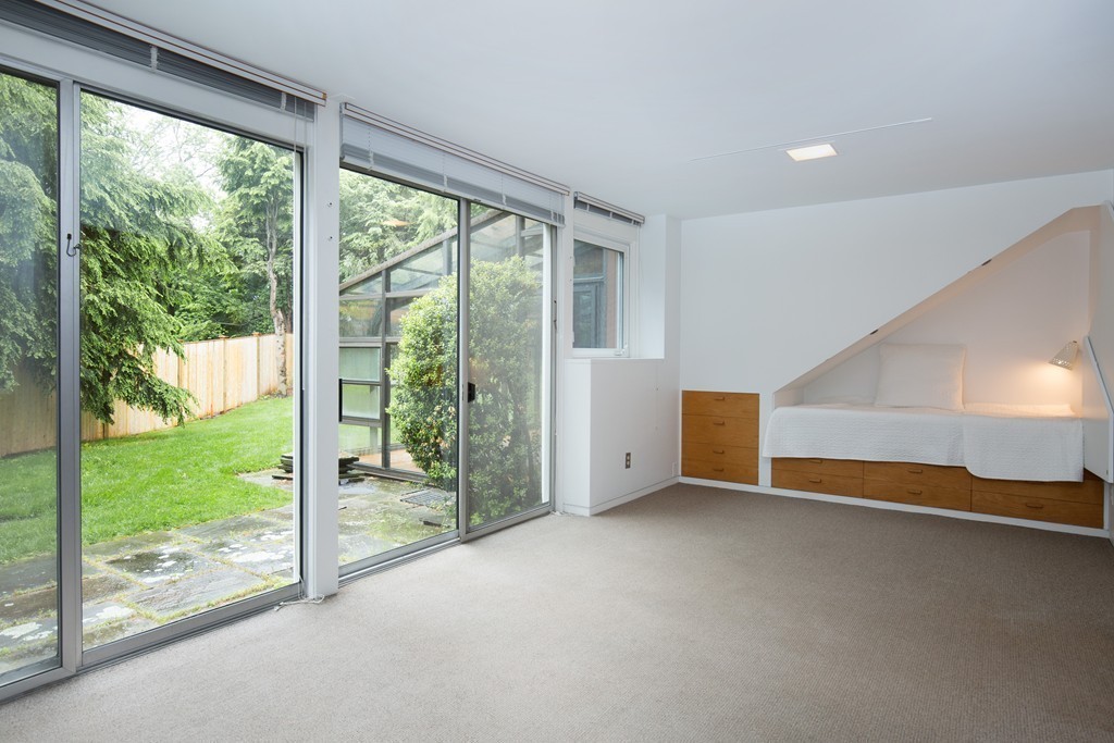 28 Barberry Road Lexington, MA 02421 - Photo 9 of 11 a view of an empty room with large windows