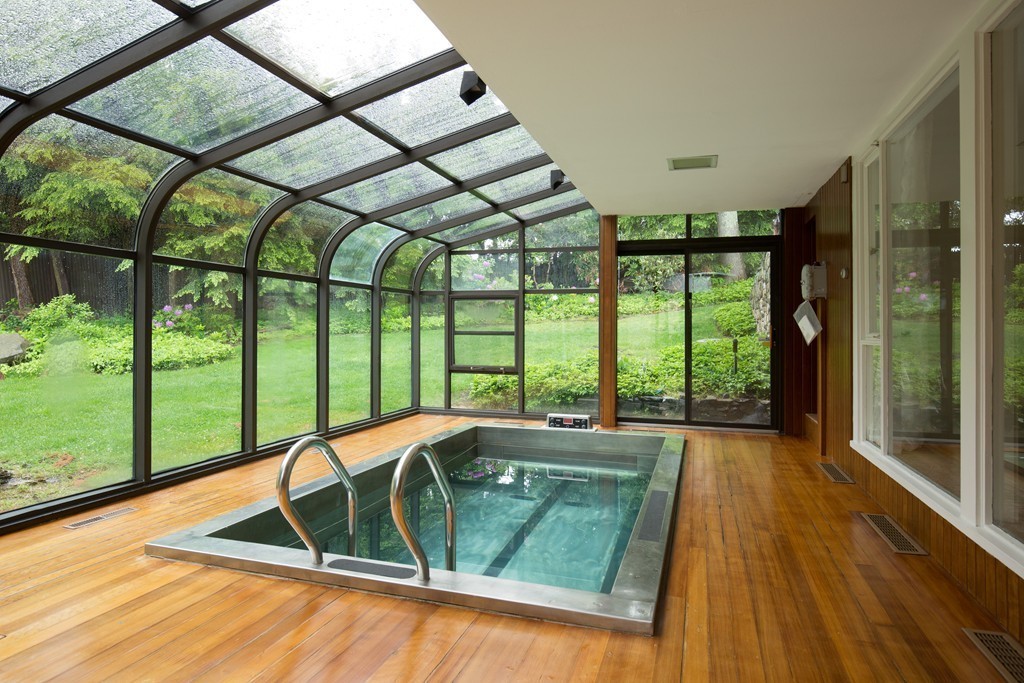 28 Barberry Road Lexington, MA 02421 - Photo 10 of 11 a living room with large windows and furniture