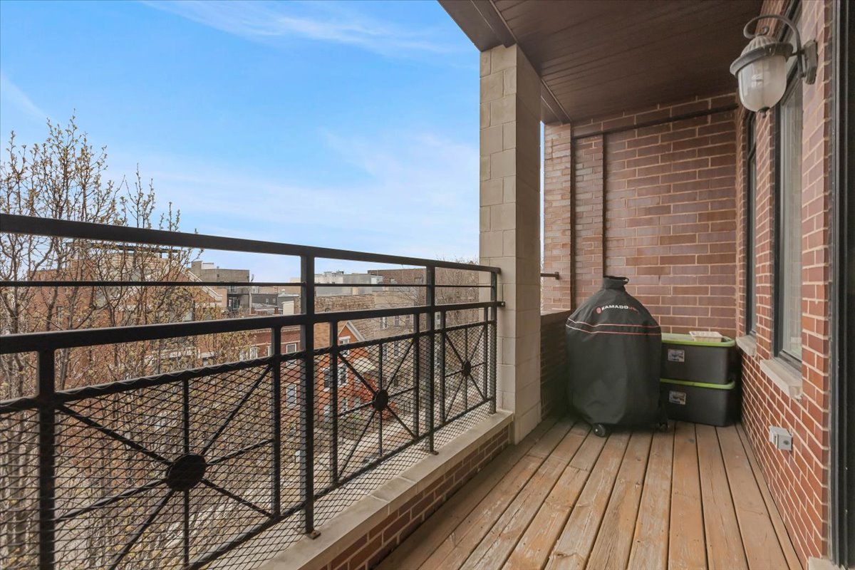 2130 West Rice Street, Unit 4 Chicago, IL 60622 - Photo 10 of 35 a view of balcony with wooden floor