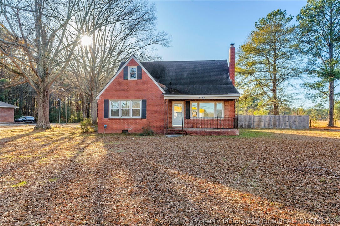 1700 Cedar Creek Road Fayetteville, NC 28312 - Photo 1 of 21 a view of a house with a yard