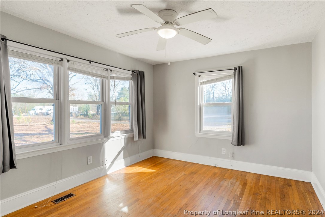1700 Cedar Creek Road Fayetteville, NC 28312 - Photo 12 of 21 a view of an empty room with a window
