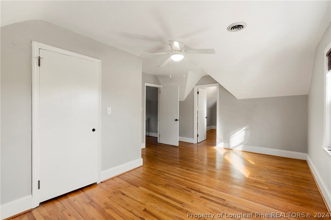 1700 Cedar Creek Road Fayetteville, NC 28312 - Photo 18 of 21 a view of empty room with wooden floor