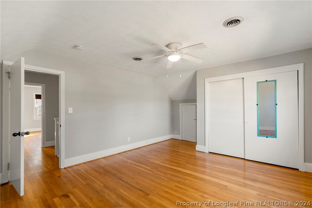 1700 Cedar Creek Road Fayetteville, NC 28312 - Photo 21 of 21 wooden floor in an empty room with a window